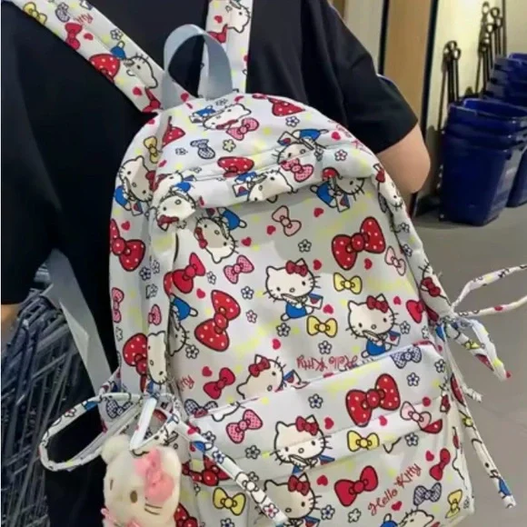 Pale Pink Hello Kitty Full Size Backpack with Bow Print - Picture 1 of 7